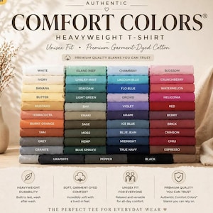 May include: A display of folded Comfort Colors heavyweight t-shirts in various colors, including white, blue, and pink. The image features the brand's logo and text, highlighting the unisex fit and garment-dyed cotton material.