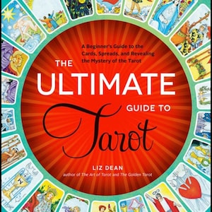 May include: A book titled The Ultimate Guide to Tarot by Liz Dean, featuring a bright red circular center with white and black text, surrounded by a ring of various colorful tarot card illustrations on a teal background.