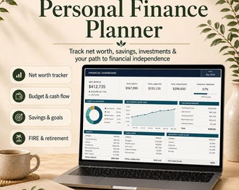 May include: A digital personal finance planner displayed on a laptop screen, featuring a financial dashboard with net worth, asset allocation, and cash flow charts. The interface includes text labels for tracking savings, investments, and retirement goals.