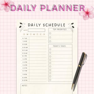 May include: A Daily Planner with a pink grid background, featuring the text "DAILY PLANNER" in pink and black. The planner includes a "DAILY SCHEDULE" section with time slots, a "TOP PRIORITIES" section, and a "TODAY'S TASKS" section. A black pen with gold accents rests on the planner.