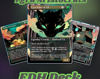 Puede incluir: Tres cartas de Magic: The Gathering con arte de fantasía. La carta central representa un gato negro con ojos verdes, titulada "Ygra, Eater of All". Las otras cartas son "Tireless Provisioner" y "Karn, the Great Creator". También se ven los textos "Ygra Aristocrats" y "EDH Deck".