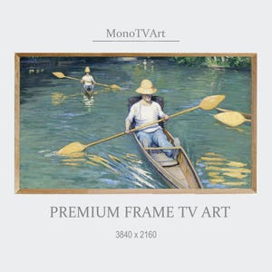 May include: A framed print of a painting depicting people rowing boats on a river. The artwork features a person in a boat with a straw hat, using a long oar. The water is a mix of green and blue, and the frame is a light brown color. Text at the bottom reads "PREMIUM FRAME TV ART".