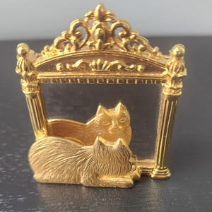 May include: A set of three ceramic mugs with a speckled, matte finish. The mugs are in shades of cream, light gray, and dark gray. Each mug has a simple, minimalist design, perfect for coffee or tea.