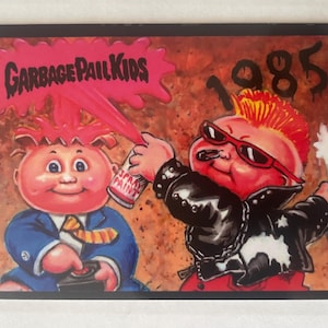 Adam Bomb x New Wave Dave Garbage Pail Kids Sammelkarte (1/100)