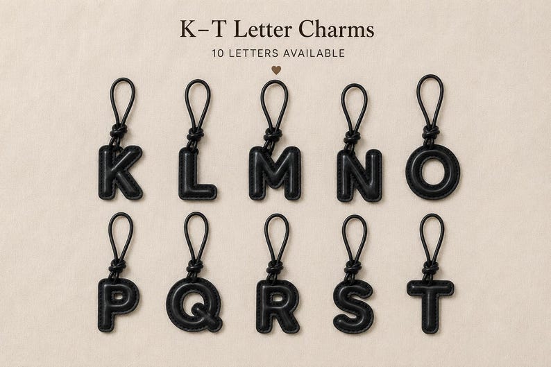 May include: Black letter charms, each with a loop for attachment. The letters K, L, M, N, O, P, Q, R, S, and T are displayed. Text at the top reads "K-T Letter Charms" and "10 LETTERS AVAILABLE".
