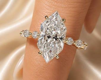 Dutch Marquise Cut 2CTS Lab-Grown Diamond Engagement Ring with Round and Marquise Diamond Accents in 14K Solid Gold.