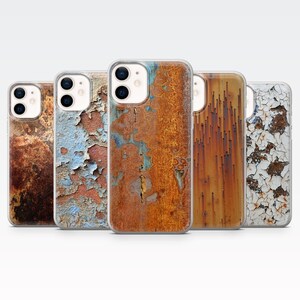 May include: Five smartphone cases with a distressed, weathered appearance. The cases display textures and colours such as rust, peeling paint, and aged metal, giving a vintage or industrial feel. The cases are designed to fit a smartphone.