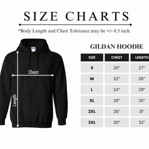 a black hoodie with measurements and size charts for different body lengths and chest sizes.