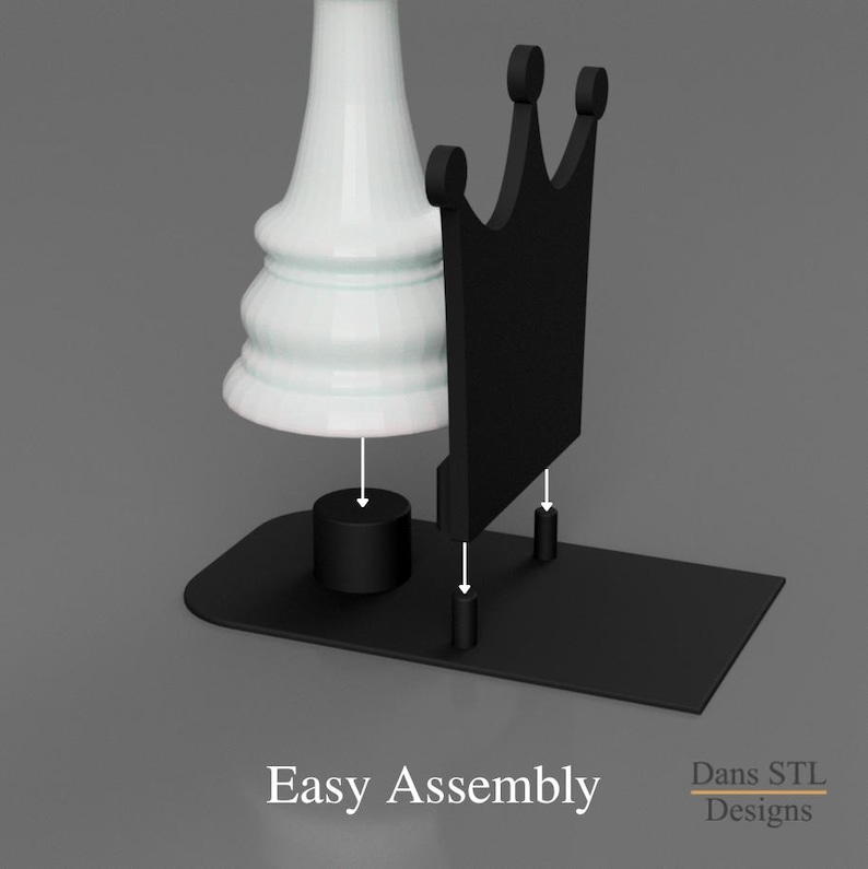 May include: A black chess piece display stand with a white chess piece and a black crown-shaped back. The base is rectangular. The text "Easy Assembly" is at the bottom.
