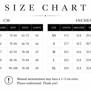 May include: A size chart table with black headers and white cells, displaying measurements in both centimeters and inches for sizes XS through XL. Columns include length, shoulder, bust, waist, and sleeve. Text at the bottom notes a 1-3 cm error.