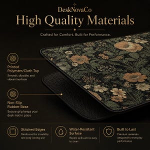 Puede incluir: Alfombrilla de escritorio con un dise&ntilde;o floral en negro, verde y naranja. Cuenta con una parte superior impresa de poli&eacute;ster/tela, una base de goma antideslizante, bordes cosidos y una superficie resistente al agua. El texto "High Quality Materials" est&aacute; en la parte superior.