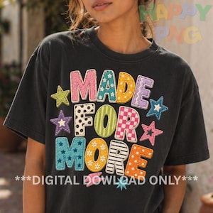 May include: A black t-shirt with the words "MADE FOR MORE" in colorful, patchwork-style letters and star accents. The text "***DIGITAL DOWNLOAD ONLY***" is at the bottom. The shirt has a relaxed fit.