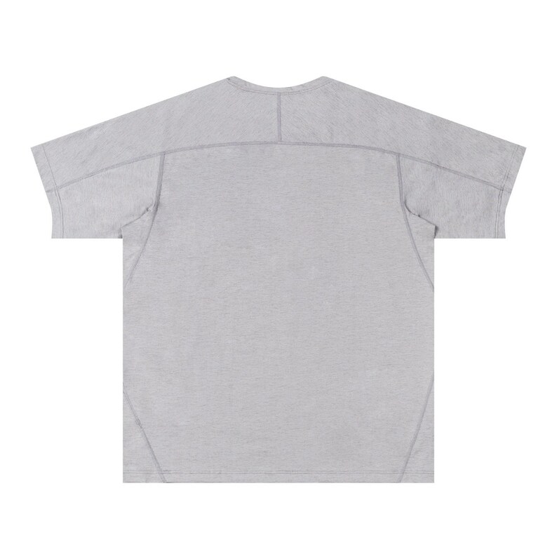 May include: A light gray short-sleeve t-shirt with a crew neck. The shirt has a relaxed fit with seams visible across the shoulders and down the back. The fabric appears to be a soft, textured material.