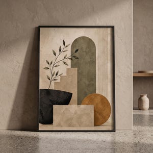 May include: A framed wall art print featuring an abstract composition of geometric shapes including a tall olive green arch, a black bowl, a tan rectangle, and a mustard yellow circle, accented by a delicate black line drawing of a leafy branch.