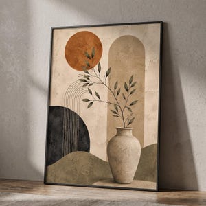 Könnte beinhalten: Ein gerahmter Kunstdruck mit einer strukturierten beigen Vase, die einen belaubten Zweig enthält. Der Hintergrund zeigt abstrakte Formen, darunter einen rostorangen Kreis, einen hohen beigen Bogen, einen schwarzen Halbkreis und feine Linien.