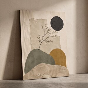 May include: A rectangular wall art print featuring a textured beige background with vertical lines on the left. It displays a black circle, a mustard yellow arch, a sage green organic shape, and a delicate black line drawing of a leafy branch.