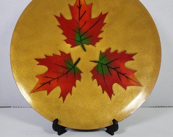 Midcentury enamel on copper fall maple leaves, red, orange, green gold background signed