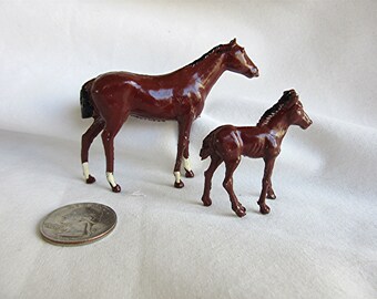 Painted metal horse and foal