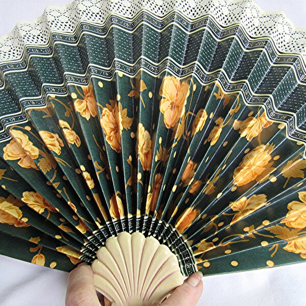 Decorative folded paper fireplace fan