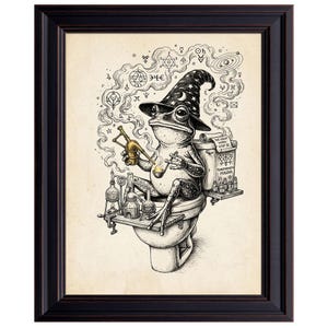May include: Black and white framed print of a frog wizard sitting on a toilet, smoking a pipe, and surrounded by alchemical symbols. The frog wears a wizard hat with stars and a crescent moon. The print includes the text "The Great Work Step 2".