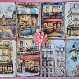 May include: A collection of eight watercolour prints showcasing Parisian scenes. The prints feature buildings, cafes, and landmarks, including the Louvre and a bakery with a bicycle. The colour palette includes blues, browns, and pinks, with a distressed border.