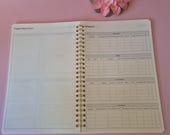 Reisdagboek roze spiraal om je avonturen te bewaren | A5 travel journal | 100 kantjes blanco papier