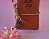 Vintage notitieboek kompas | blauw lederen travel journal met scheepsroer | cadeau reiziger