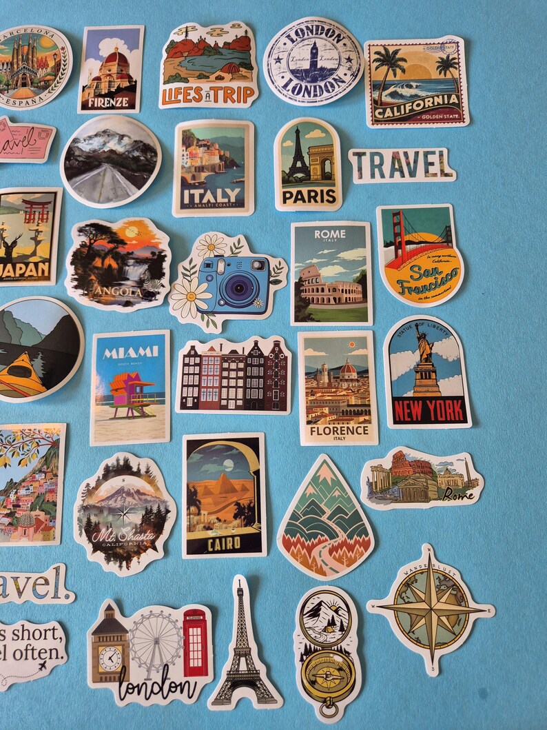 May include: A collection of travel-themed stickers featuring landmarks and destinations like the Eiffel Tower, the Statue of Liberty, and the Golden Gate Bridge. The stickers showcase various cities and countries, including London, Paris, and Italy.