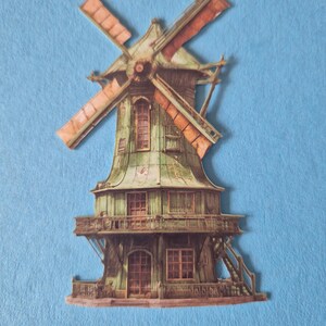 May include: A detailed illustration of a weathered windmill with a green roof and brown blades. The windmill has multiple windows and a balcony, set against a light blue background. The blades are a reddish-brown color.