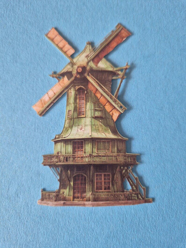 May include: A detailed illustration of a weathered windmill with a green roof and brown blades. The windmill has multiple windows and a balcony, set against a light blue background. The blades are a reddish-brown color.