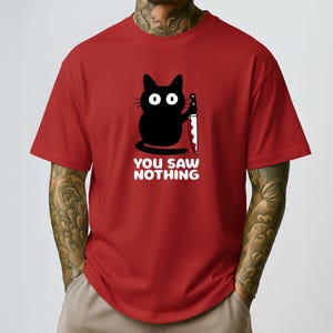 Maglietta con gatto "Non hai visto niente", maglietta divertente con gatto nero, regalo con umorismo nero, battuta sul gattino minaccioso, per amanti dei gatti, unisex