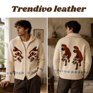 May include: A cream-coloured zip-up knit cardigan featuring a shawl collar, two front pockets, and a pixelated fox graphic on the chest and back. The hem and cuffs are decorated with a light blue snowflake pattern. The text Trendivo leather is visible.
