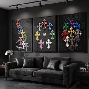 May include: A triptych of framed wall art featuring black backgrounds with embossed circular patterns and the text CHROME HEARTS. The artwork displays various colourful cross motifs in red, blue, yellow, green, pink, white, purple, gold, and silver.