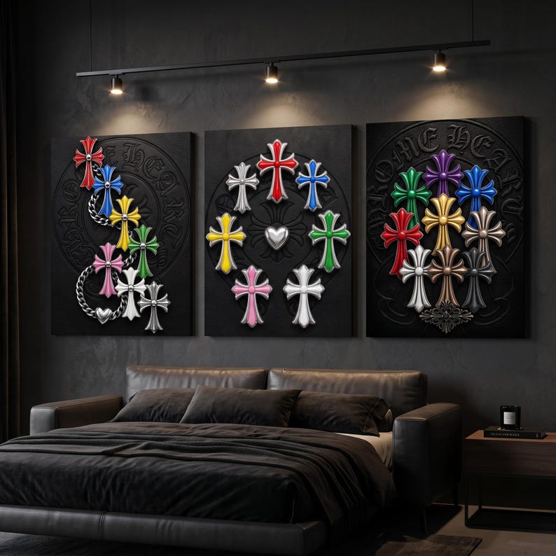May include: A set of three rectangular wall art canvases featuring embossed black backgrounds with the text CHROME HEARTS. Each canvas displays a collection of multi-coloured, three-dimensional cross emblems in red, blue, yellow, green, pink, white, and silver.
