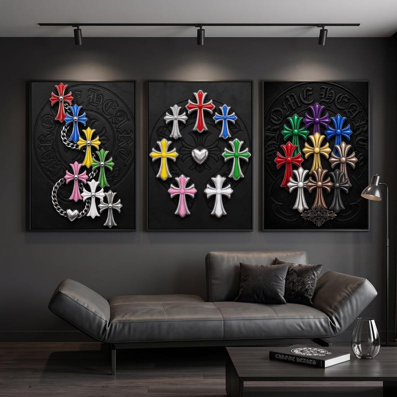 May include: Three framed wall art prints featuring black backgrounds with embossed circular motifs and the text CHROME HEARTS. The artwork displays various colourful cross-shaped emblems in red, blue, yellow, green, pink, white, and metallic tones.