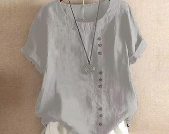 Blusa feminina de manga curta, modelagem solta, gola redonda, estilo túnica casual.