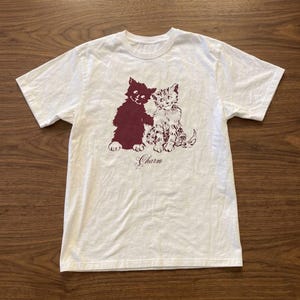 Collection Cocteau Y2K Clairo Charm Baby Tee, Graphic tee, Unisex Cotton shirt