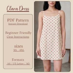 May include: A cream-coloured slip dress adorned with a pattern of small red hearts. The dress features thin straps and an A-line shape. Text on the left reads "Clara Dress", "PDF Pattern", "Beginner Friendly", and "sizes XS 4XL".