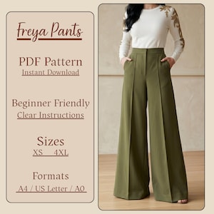 May include: The image features a woman wearing olive green wide-leg pants and a white long-sleeve shirt with gold embroidery. Text on the left side reads "Freya Pants," "PDF Pattern," "Beginner Friendly," and "Sizes XS - 4XL."