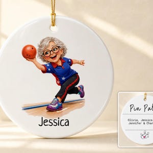 May include: A round white ceramic ornament featuring a cartoon illustration of a person with gray hair and glasses bowling with a red ball. The name Jessica is printed below. The reverse side displays the text Pin Pals, names, and a bowling icon.