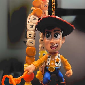 May include: A set of three ceramic mugs with a speckled, matte finish in cream, light grey, and dark grey. Each mug has a simple, minimalist design, suitable for coffee or tea.