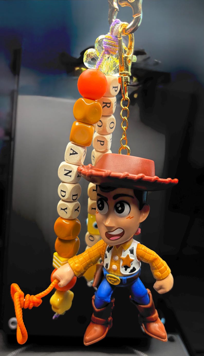 May include: A set of three ceramic mugs with a speckled, matte finish. The mugs are in cream, light grey, and dark grey. Each mug has a simple, minimalist design and a rounded handle.