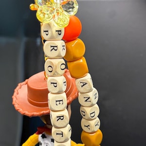 Sheriff Woody Bag Charm: Interactive Toy Story Keychain with Twirling Lasso image 2