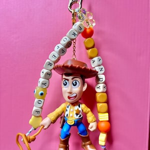 May include: A weathered wooden sign displaying the words "Welcome to our porch" in white. The sign has a distressed appearance, ideal for adding a touch of rustic charm to a porch or garden.