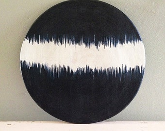 Ceramic plate, nearly black deep blue and white organic design. Brushed lines.