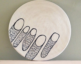 Ceramic plate, nearly black deep blue and white organic design.