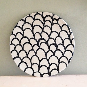 Ceramic plate, nearly black deep blue and white organic design. Scales.