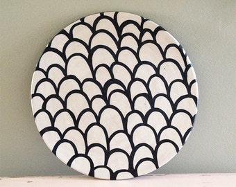 Ceramic plate, nearly black deep blue and white organic design. Scales.