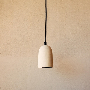 Ceramic pendant light. Minimalistic contemporary design