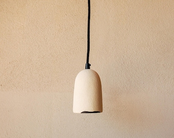Ceramic pendant light. Minimalistic contemporary design